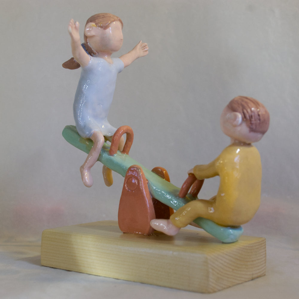 Le temps de l'innocence, balançoire à bascule
