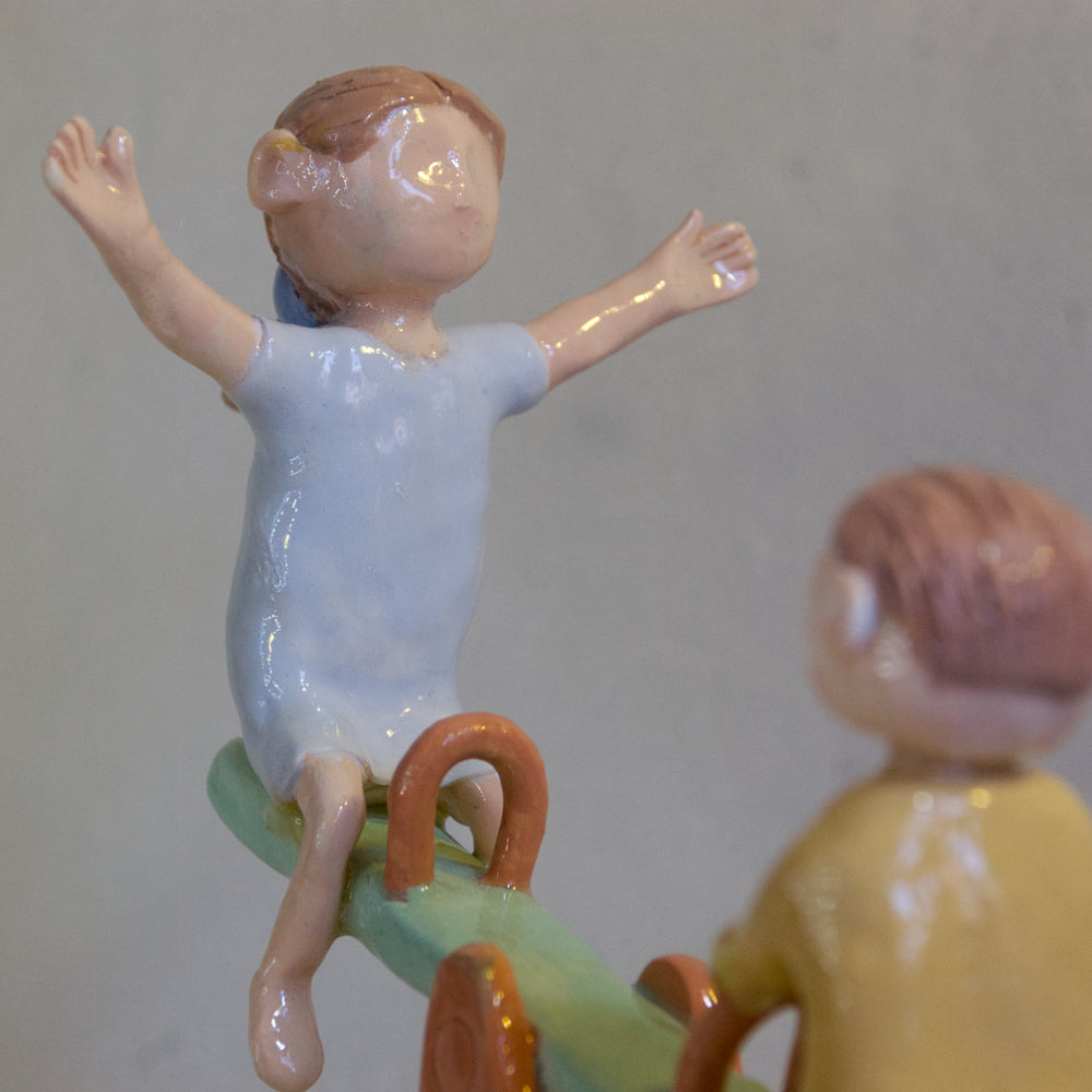 Le temps de l'innocence, balançoire à bascule